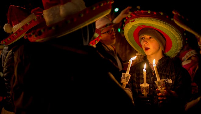 Carolers sing in front of the Red Lion Inn in downtown Stockbridge, Massachusetts, on December 2, 2017. The rural Massachusetts town of Stockbridge celebrates the holiday season with carols and concerts, culminating in the transformation of Main Street into a recreation of a scene from a 1967 Norman Rockwell painting.