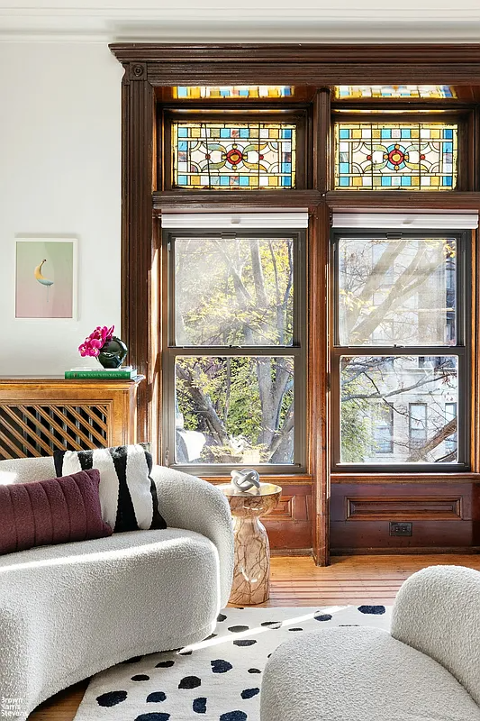 Bedroom detail with multicolored stained glass