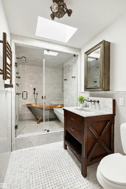 Bathroom with walk-in shower and bathtub