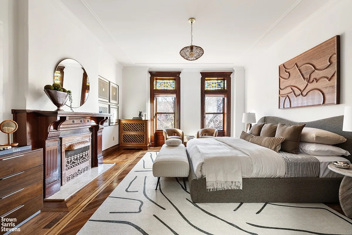 Bedroom with mantel, stained glass,