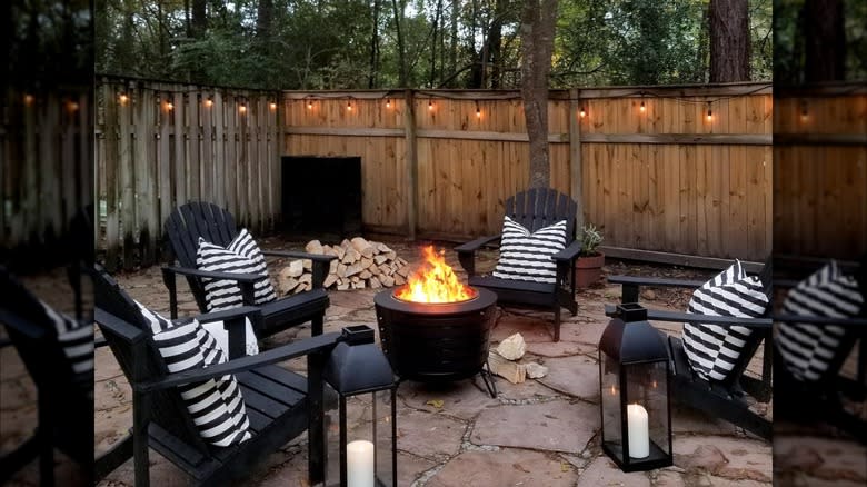 Adirondack chairs surround a smoke-free TIKI fire pit