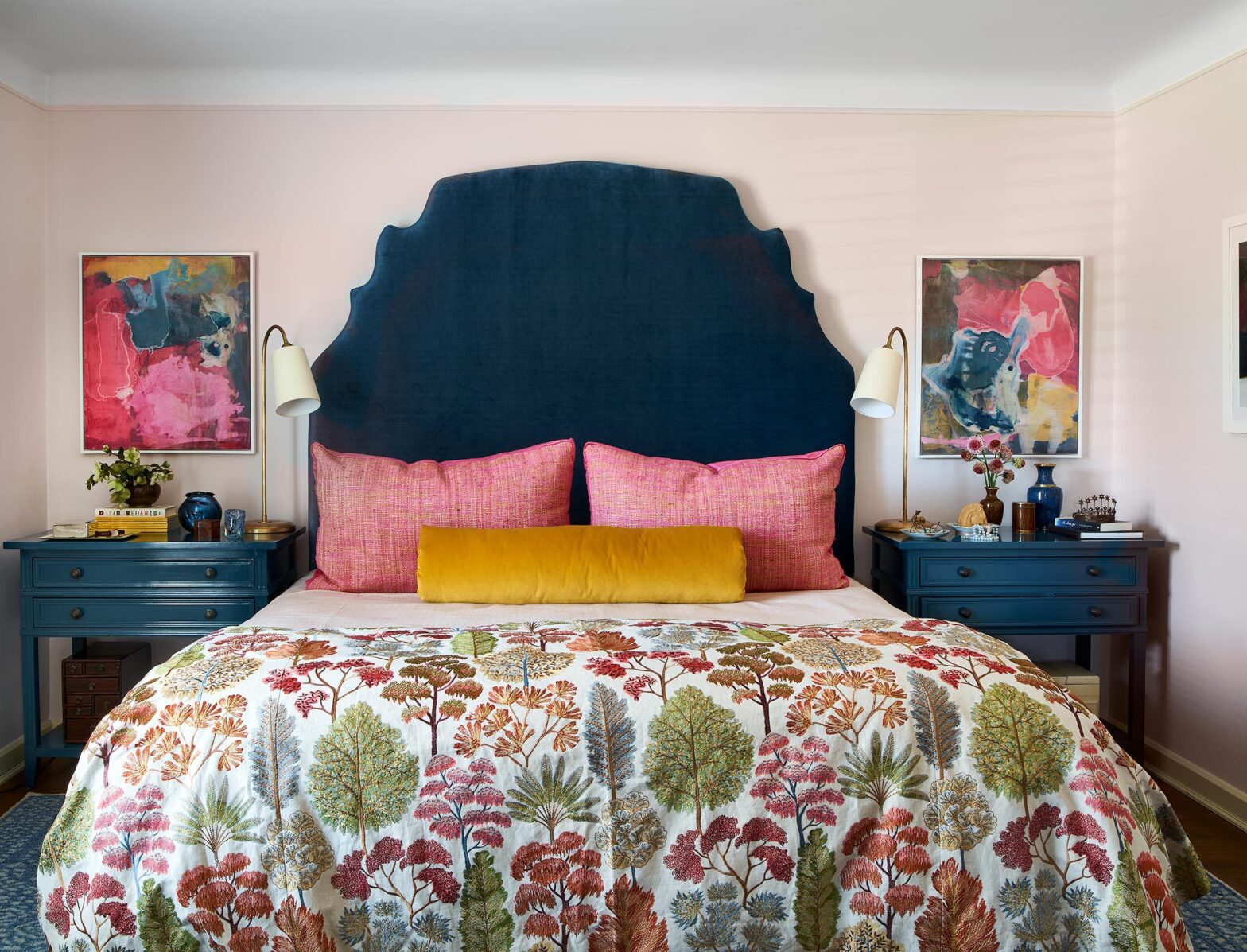 The top bedroom trends for 2025 include eye-catching headboards and moody hues