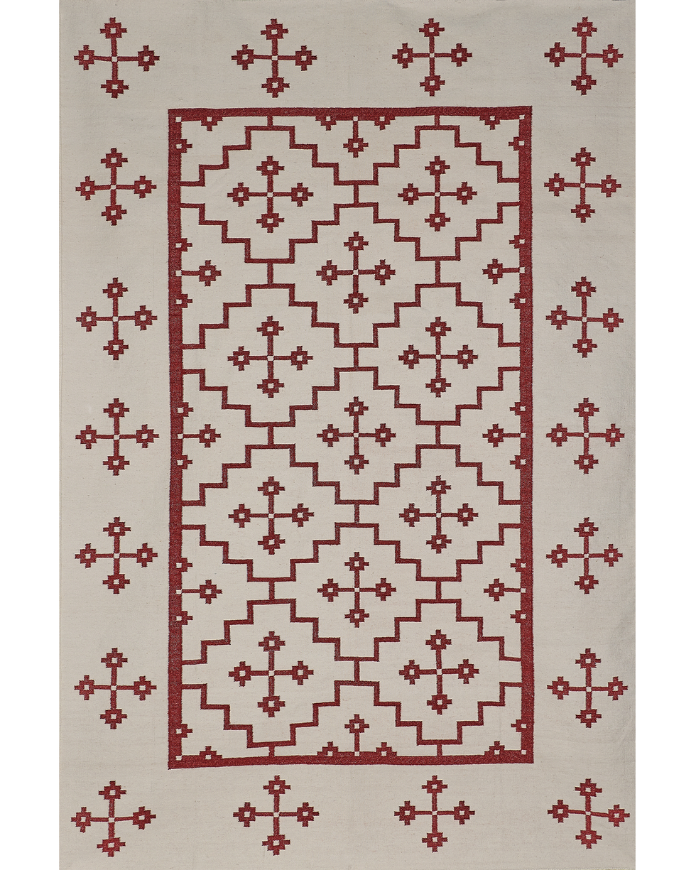 Geometric rug in red on white