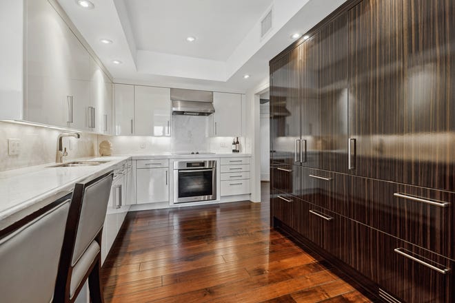 The downsview kitchen has state-friendly cupboards made of exotic zebrawood.