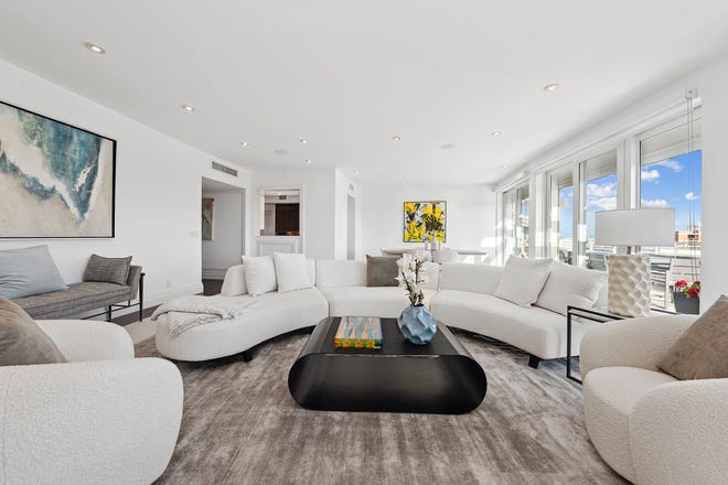 With a curved section, the living area is flooded with natural light during the day. The dining area is at the other end.