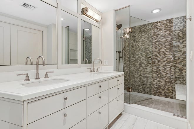 The bathroom of the main sleeping room has a walk -in shower.