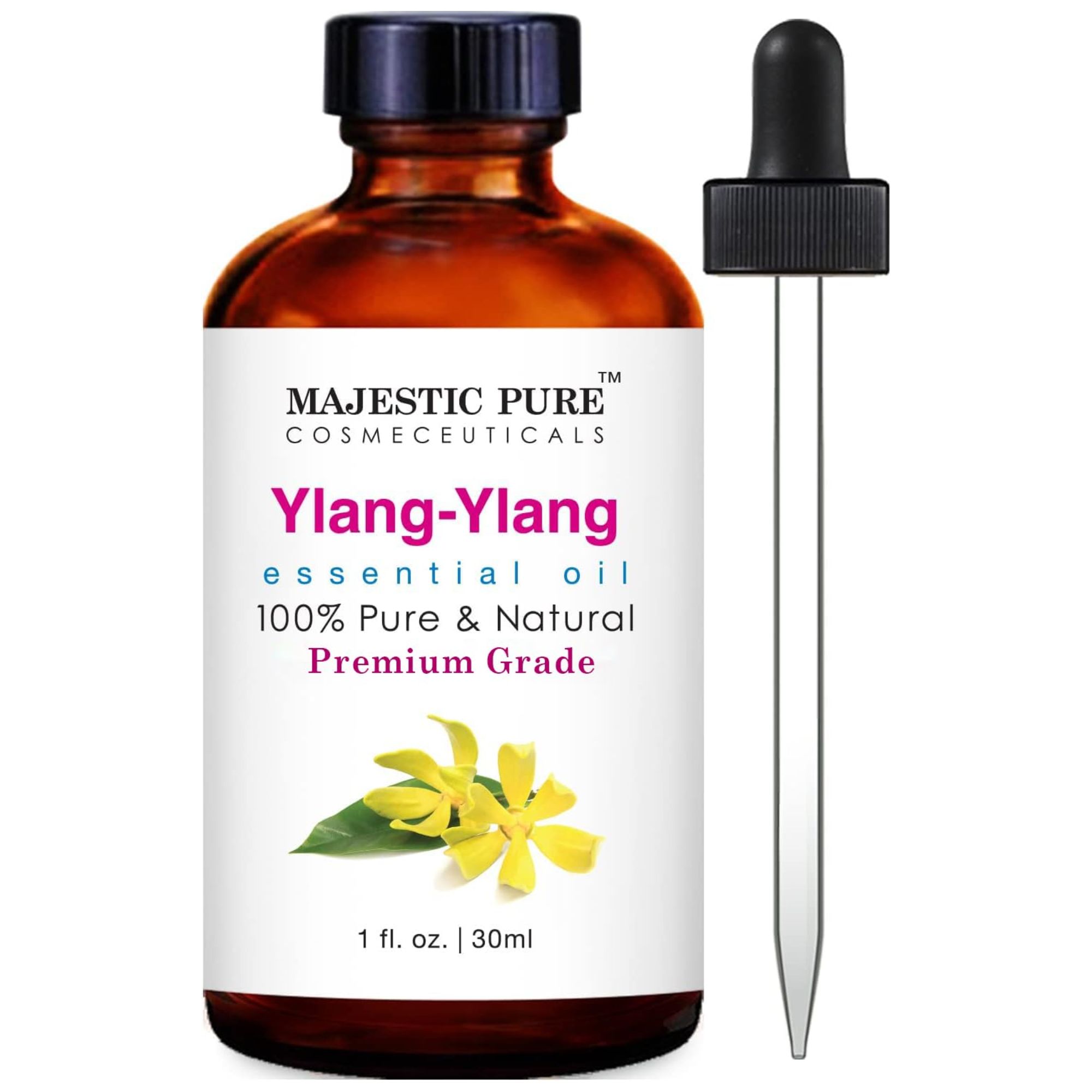 A brown glass bottle of essential ylang-ylang oil with a white label with ylang-yang flower and blue, pink and black text and pipette with a black lid