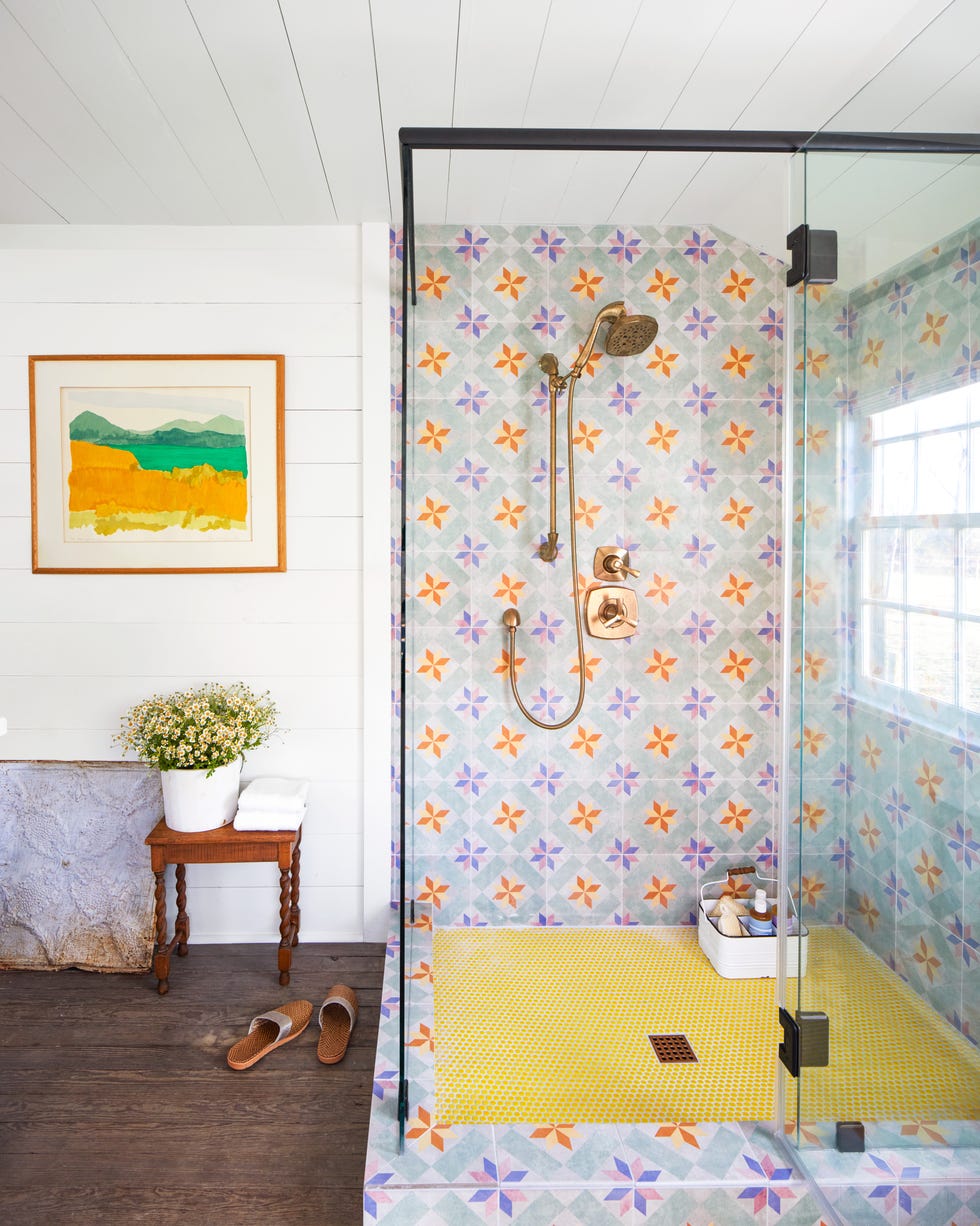 Farmhouse Bathroom with colorful, quilt patterned tiles in the shower