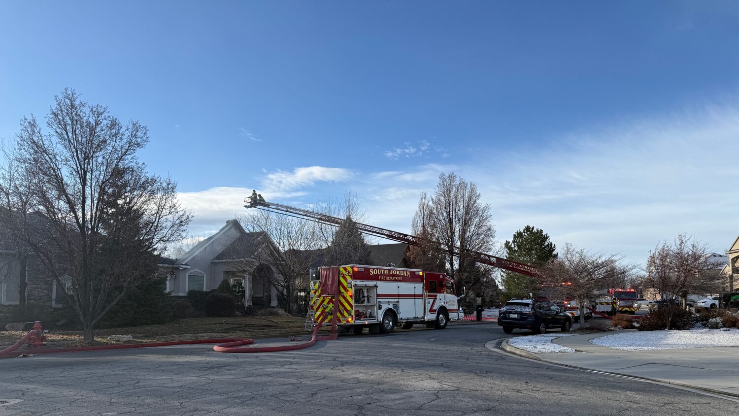 Firefighters work on a fire near the Glenmoor Golf Club