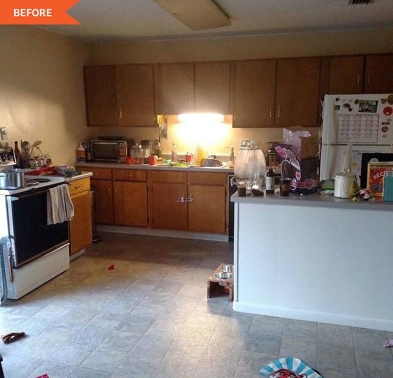 Large kitchen with wooden cabinets and tiled soils