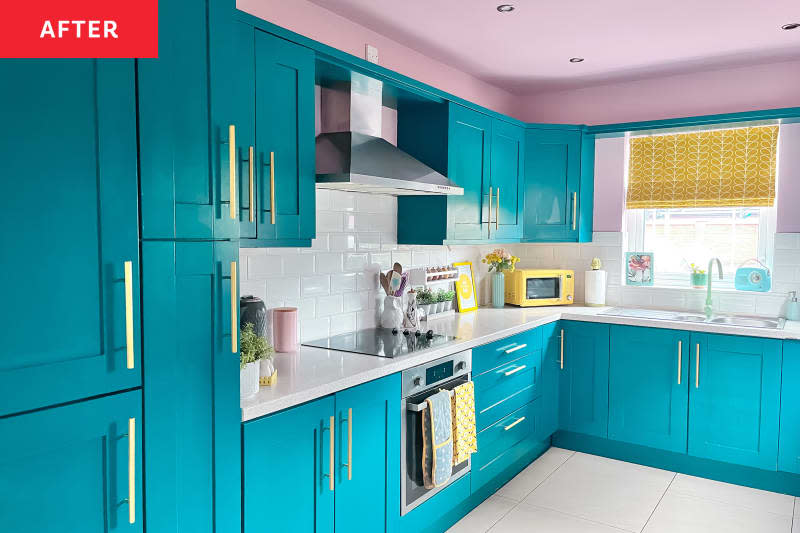 Kitchen after renovation/painting. Bright turquoise cupboards and drawers, pink ceiling, white meters, white and railway -backplash, bright brass/gold hardware, yellow and pink accents