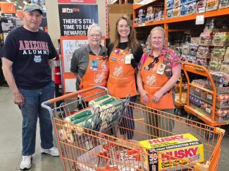 The Lighthouse Foundation accepts the supply donation from Home Depot