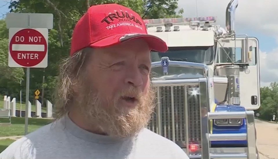 Screenshot of a news report about a car that crashed through a roof, with an interview with a man in a red "Trump card" Hat.
