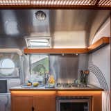 Wright designed a mobile trailer in 1939, the Dinky Diner, but it was never built. This trailer extends some of his ideas.