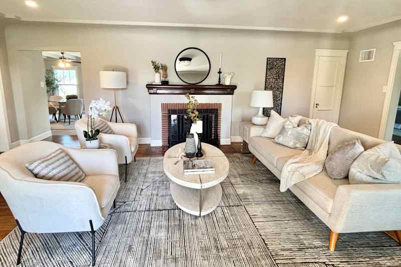 Neutral furniture in the living room after the trip.