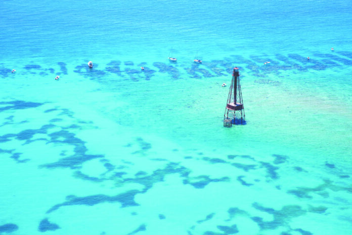 An aerial absorption of a sailing boat in the water