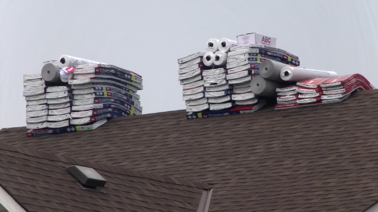 Members of a Lakeville Townhome Association, the legislative template for roof damage questioned by a storm