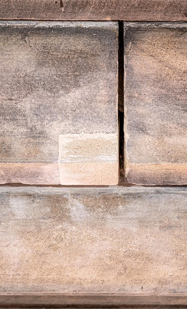 A damaged section of a sandstone block was cut out and replaced by a carefully agreed use - a complex repair, which is called Dutch. (Photo credit: public services and procurement Canada)