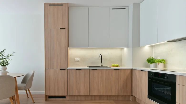 Kitchen with elegant cupboards, white oak cabinets