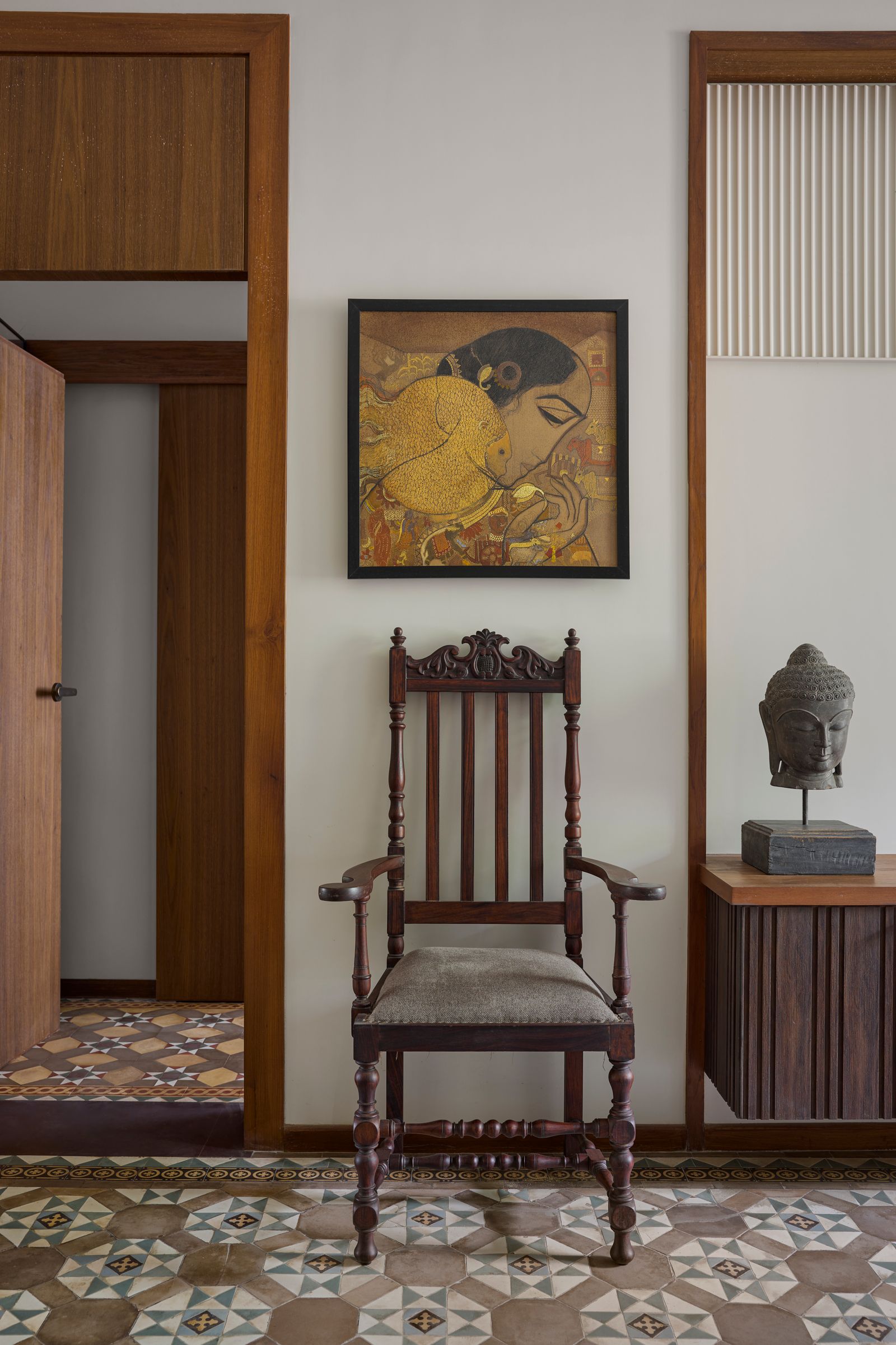 Image can contain Gautama Buddha in interior design in the interior design Floor Floor's chair furniture art painting and adults