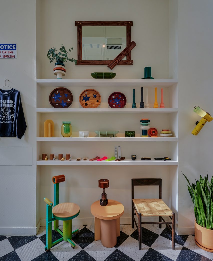 Display of seating and small objects on the shelves