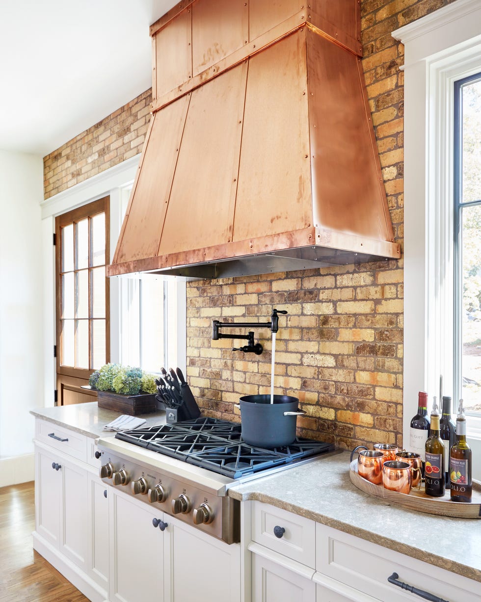 Copper furnace ventilation in Country Home Kitchen