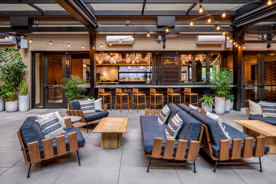 Arrels Restaurant Arlo Hotel Washington DC Spanish Cultural Heritage Outside Road Lights Blue Blue Chairs Bar Black Tiles