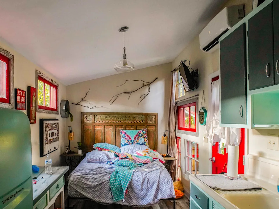 In a tiny home with an unnecessary bed