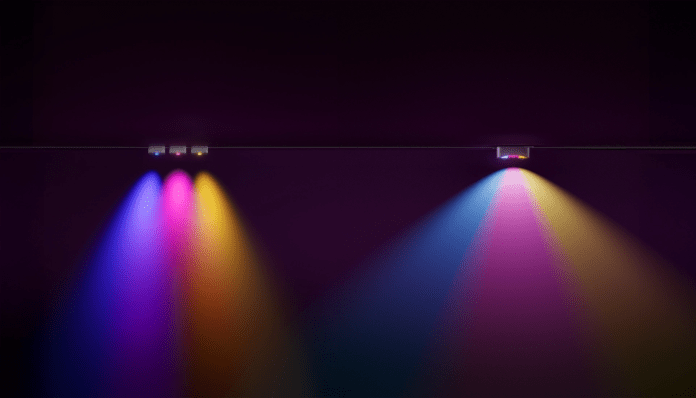 Close up of GOVES Permanent Outdoor Lights Prisma shows colorful beams in a dark environment and underlines the optical triple color effect.