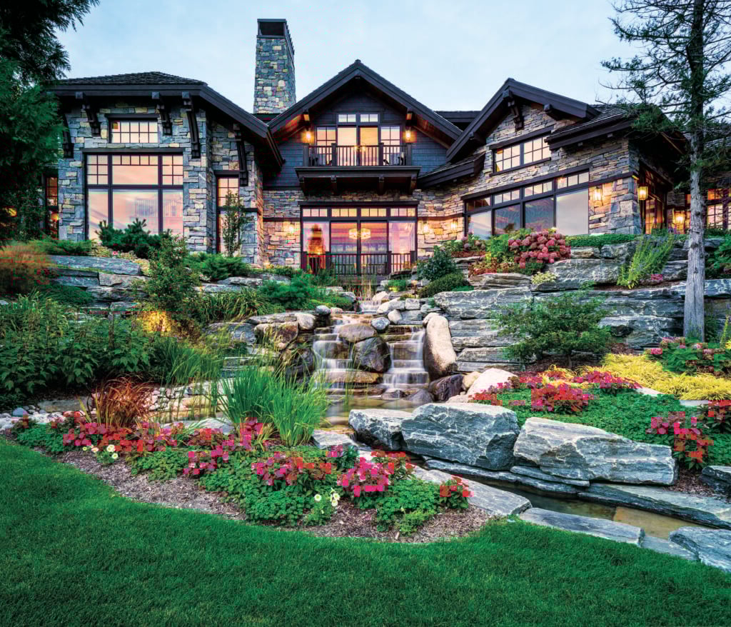 The construction site was added to an extensive flowing water, surrounded by several plant beds and hardscape elements to soften the design and add color and depth at the same time. (Photo: Chris Major)