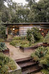 The ceramics studio was built using the posts and beams of an abandoned pergola from the old property.