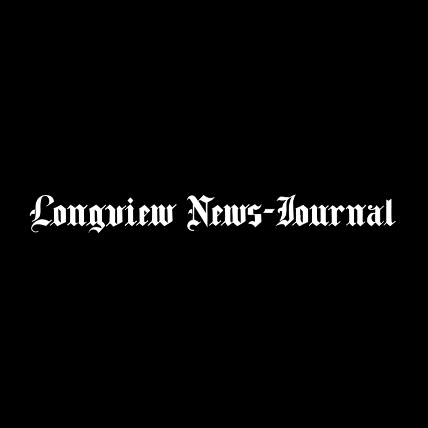 Longview business owner celebrates completion of restoration of historic property