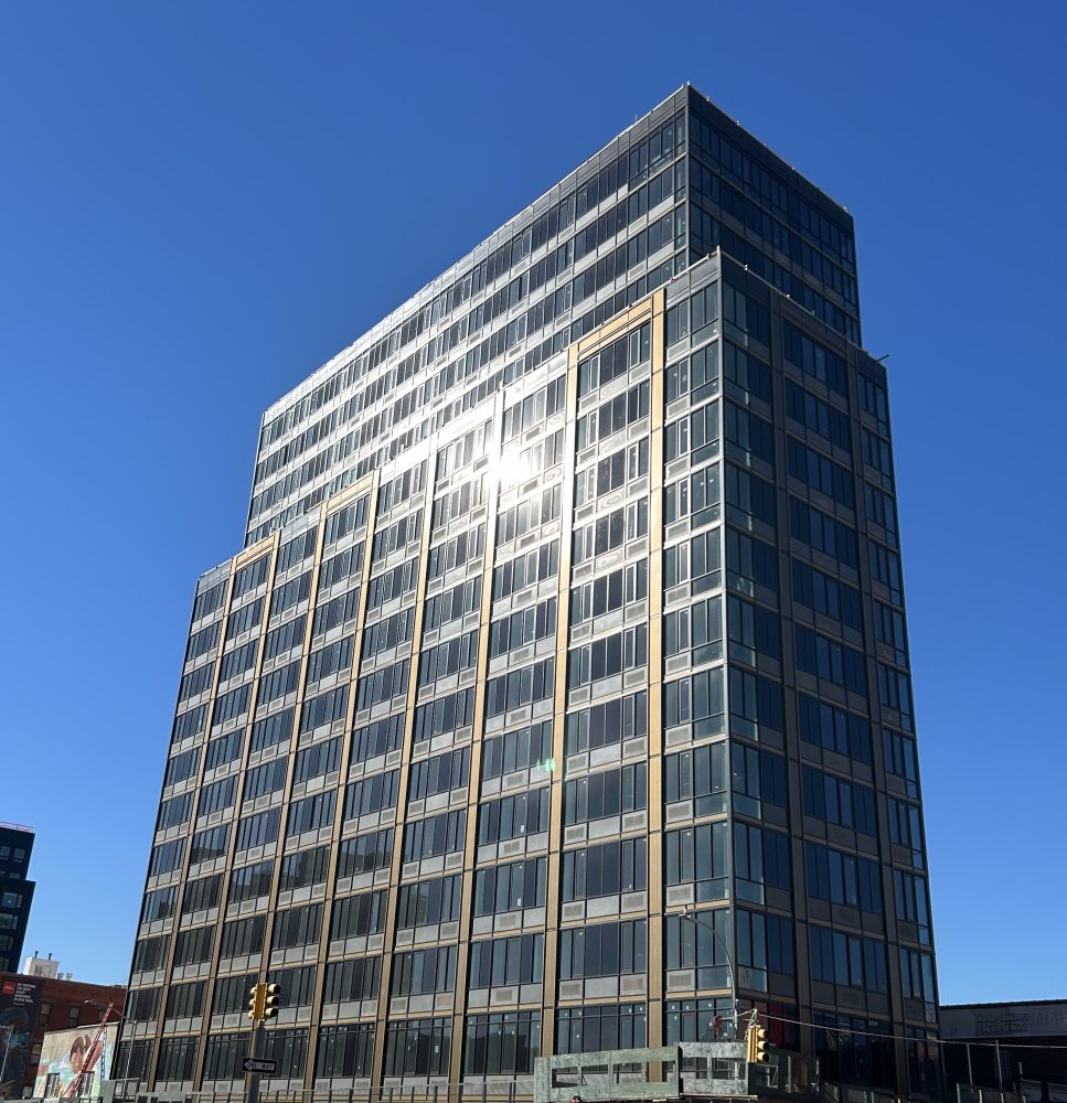 The interplay of glass and metal defines a modern city facade