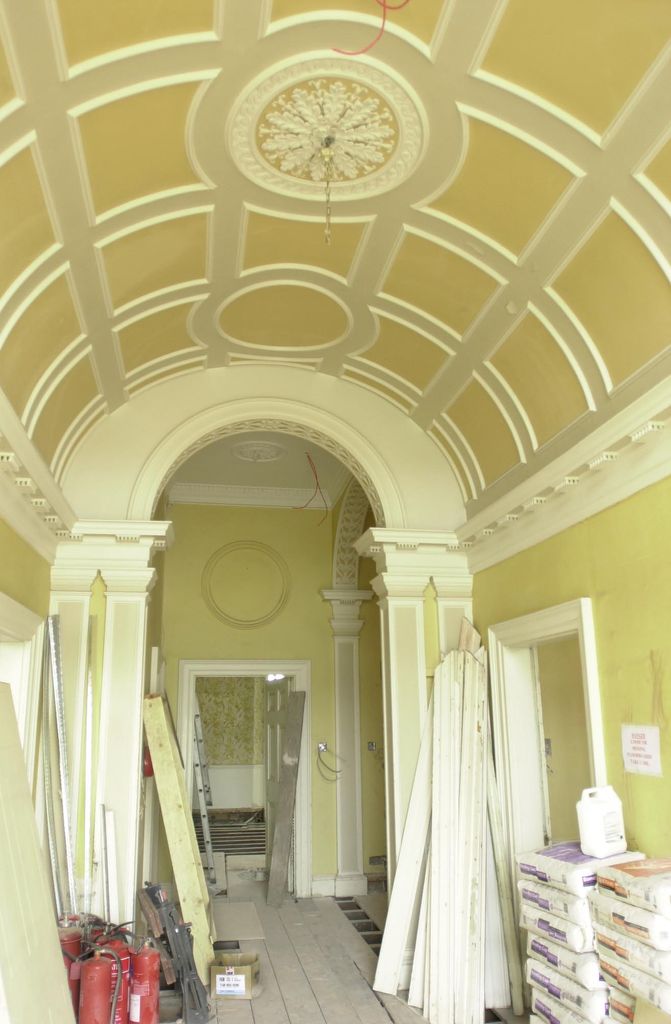 The entrance hall of the Grade II listed Forest Lodge in Windsor Great Park, Berkshire, is renovated in 2001