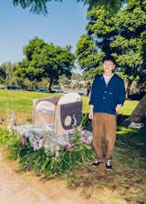 Designer Oscar Chang stands next to his Stratum chair. The design won our Best Seat in the House competition and is produced by Vesta Home.