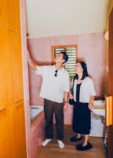 Pink marble reappears in the guest bathroom, where Stampton designed and prototyped the door and cabinet handles.