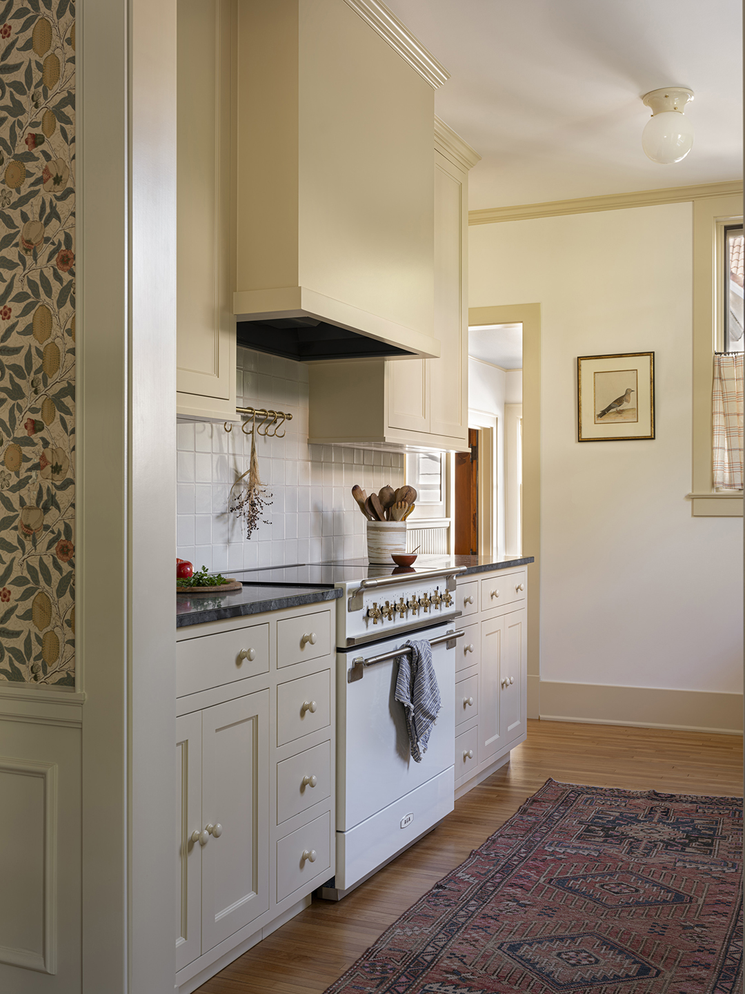 airy kitchen with stove and extractor hood
