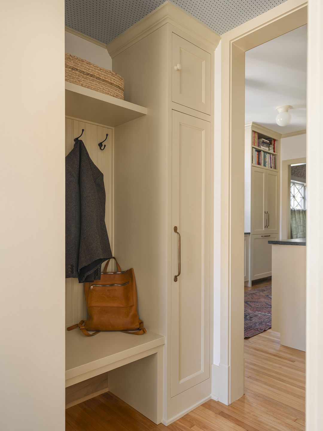 Coats and closet in a mudroom