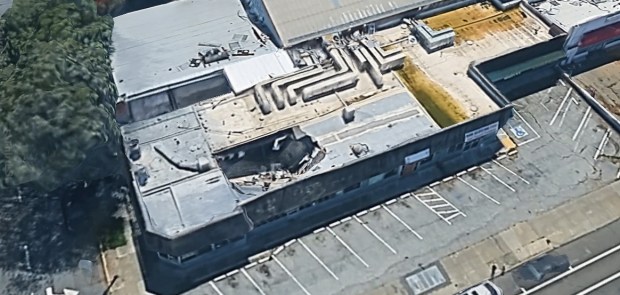 Vacant retail and commercial building at 98 East San Salvador Street in downtown San Jose, bird's-eye view, as seen in 2025. (Google Maps)
